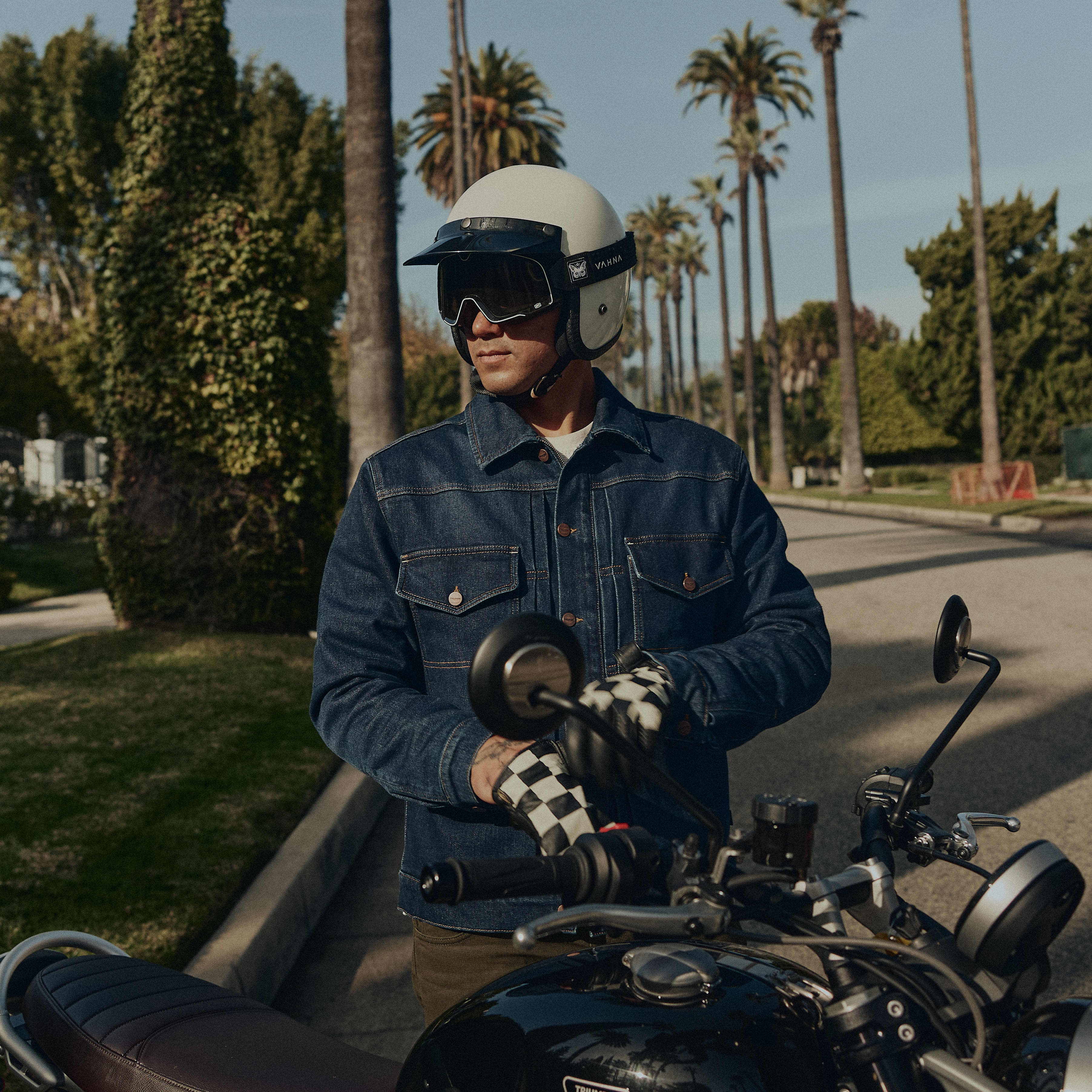 Man on a bike wearing Triumph Motorcycles Clothing