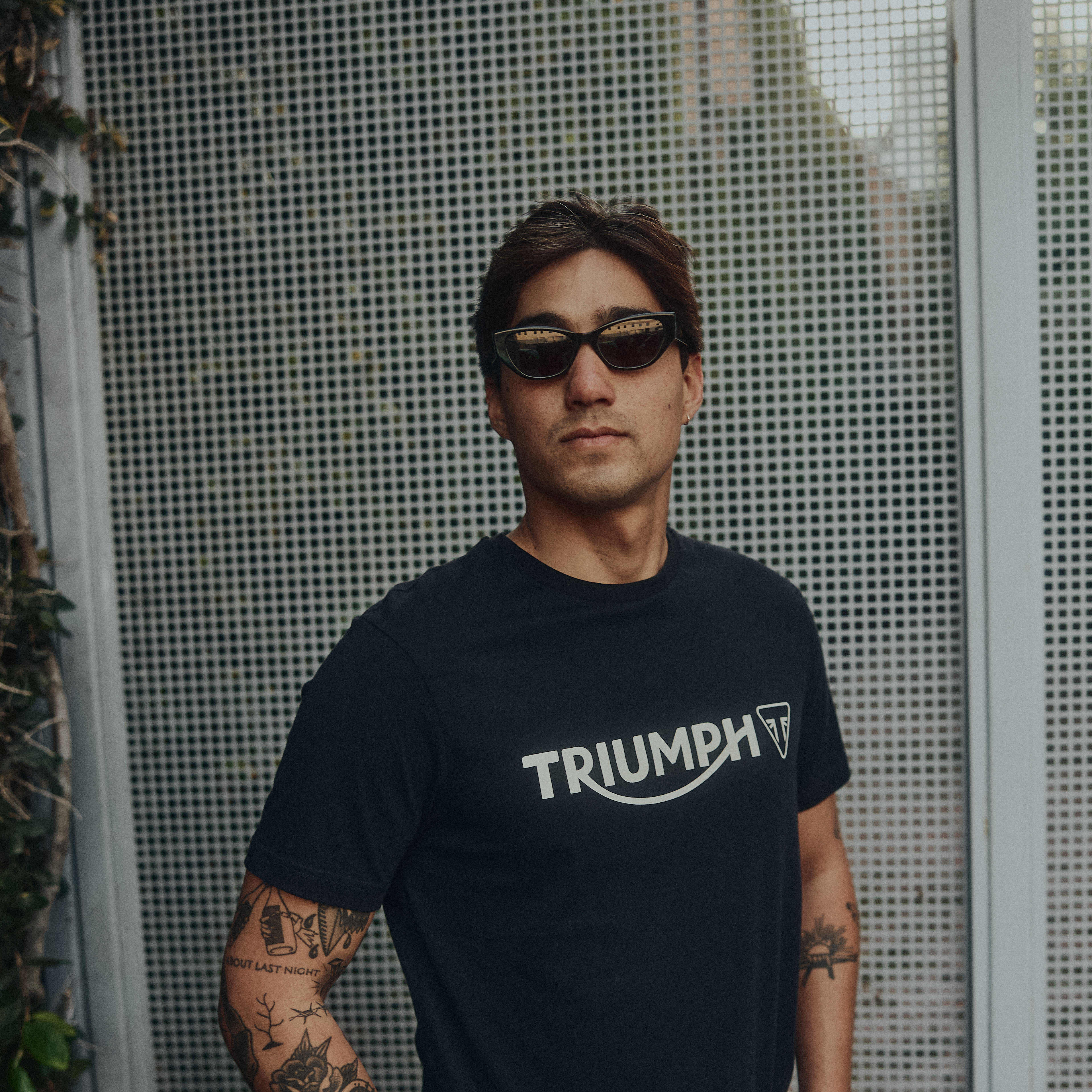 Close up of man wearing black cartmel tshirt